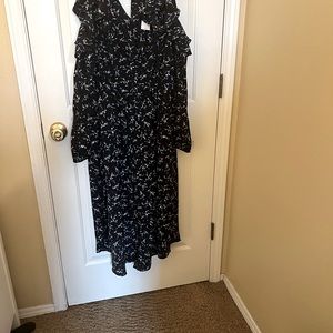 Lane Bryant is Brand New with tags on, a floral dress in size 12. Polyester 100%